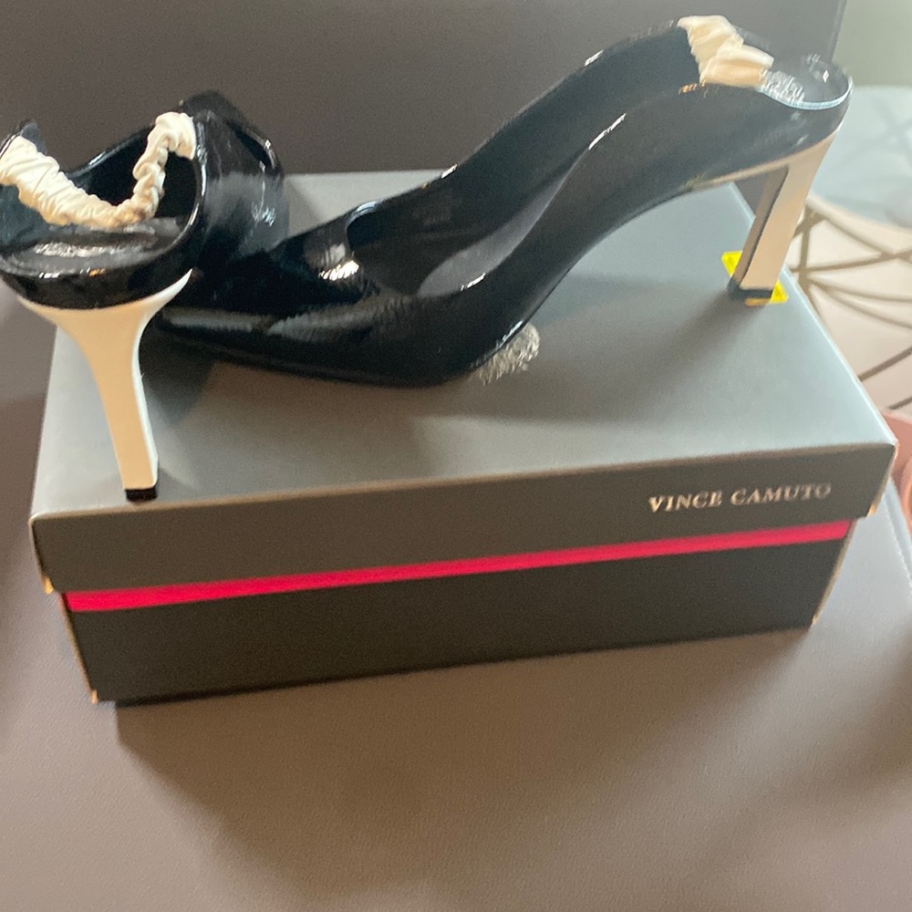 Vince Camuto black and white heels.